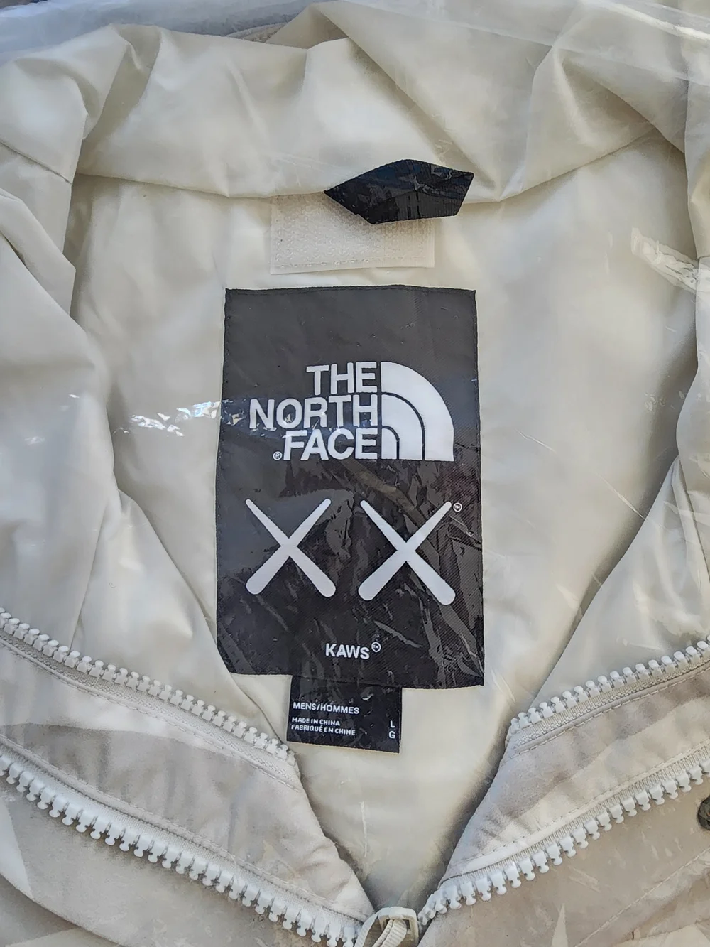 The North Face x KAWS 1986 Retro Mountain Jacket Moonlight Ivory Camo L